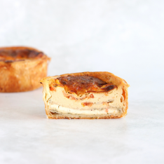 Individual goat cheese and tomato quiche